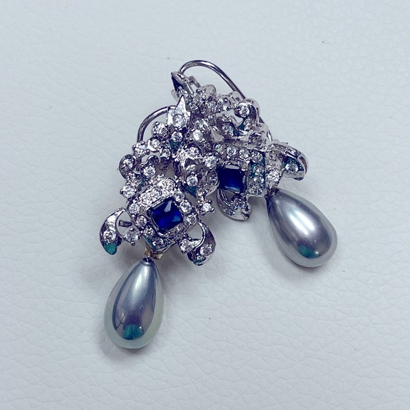 Silver tear drop embellished earrings - Picture 2 of 2